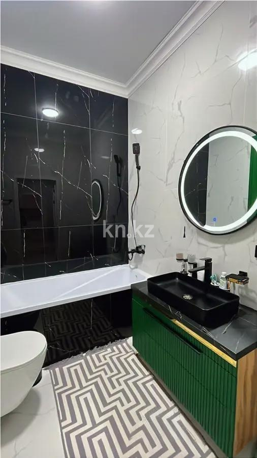 Продажа 2-комнатной квартиры, 60 м², ул. Омарова, дом  2/1 в Астане - фото 4