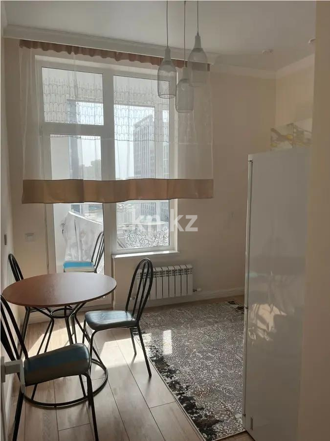 Продажа 1-комнатной квартиры, 52 м² в Астане - фото 2