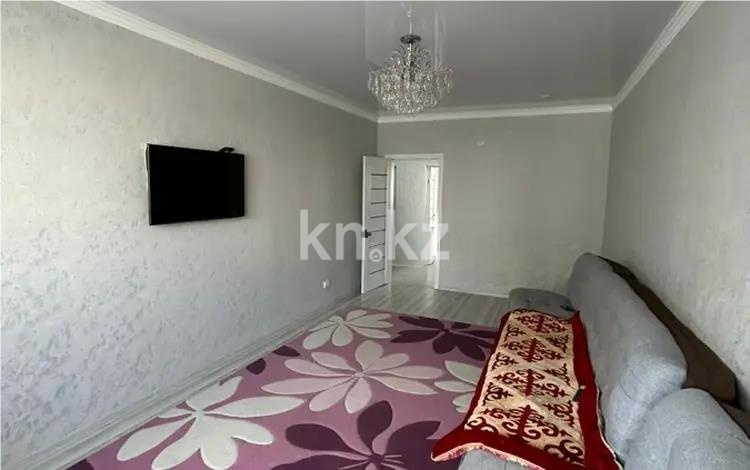 Продажа 2-комнатной квартиры, 64 м², мкр-н Жас Канат, дом  1/49 - Продажа квартир в Алматы фото 1 из 4