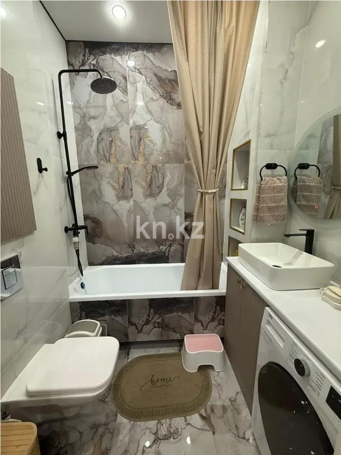 Продажа 2-комнатной квартиры, 60 м², ул. Казыбек би, дом  9 в Астане - фото 5