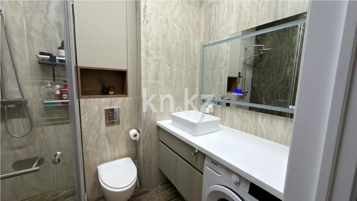 Продажа 2-комнатной квартиры, 65 м², ул. Толе би, дом  27 в Астане - фото 4