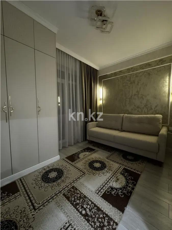 Продажа 2-комнатной квартиры, 52 м², пр. Республики, дом  49 в Караганде - фото 2