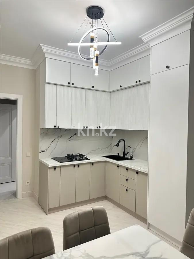 Продажа 1-комнатной квартиры, 40 м², мкр-н Нуркент, дом  9/4 в Алматы - фото 2