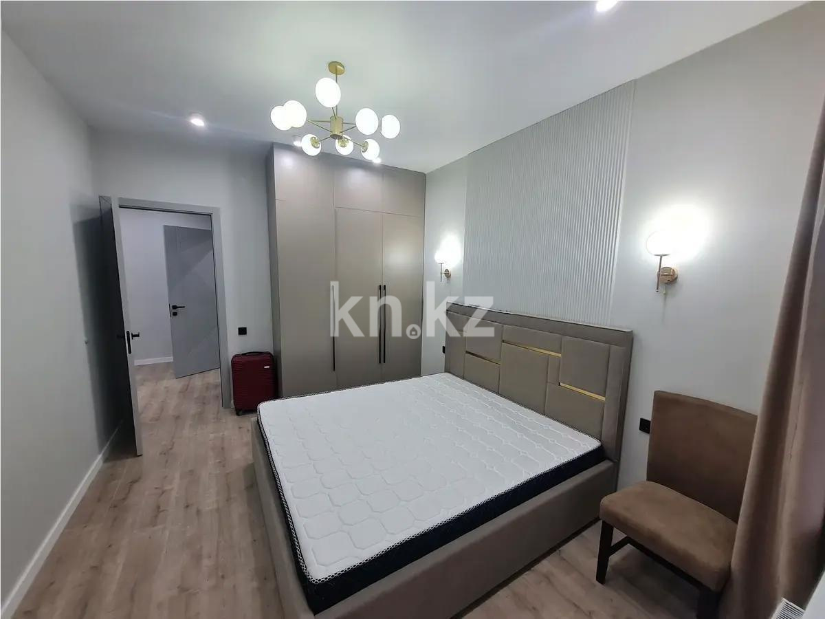 Продажа 2-комнатной квартиры, 50 м², ул. Толе би, дом  63 в Астане - фото 2